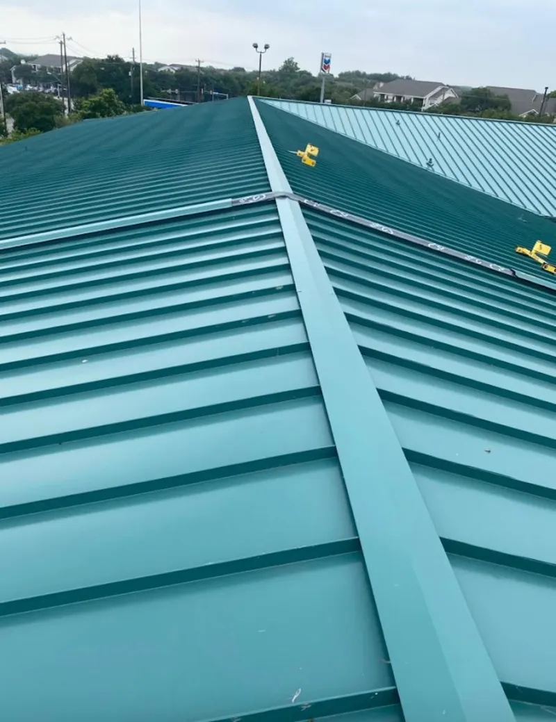 Green commercial metal roof ridge and valley for Metal Roof Repair in Bull Mountain