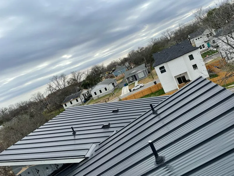 Standing seam metal roof panels with vents for Skylight Repair in Bull Mountain